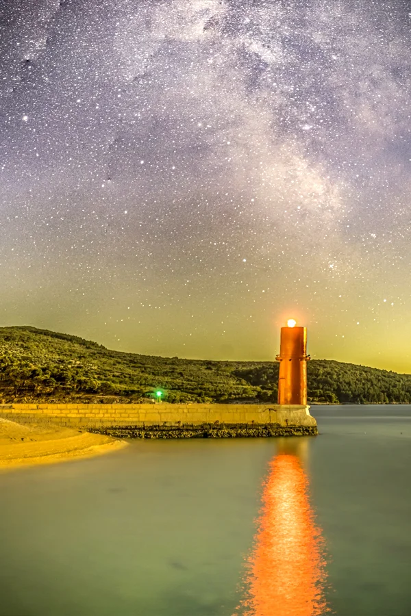 Starry sky above lighthouse on Cres Island